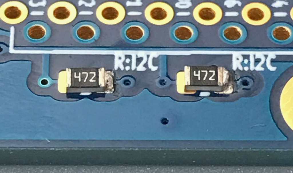 Resistors tacked down and flat