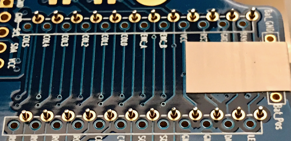 Socket bottoms, MCU taped on other side, ready to solder