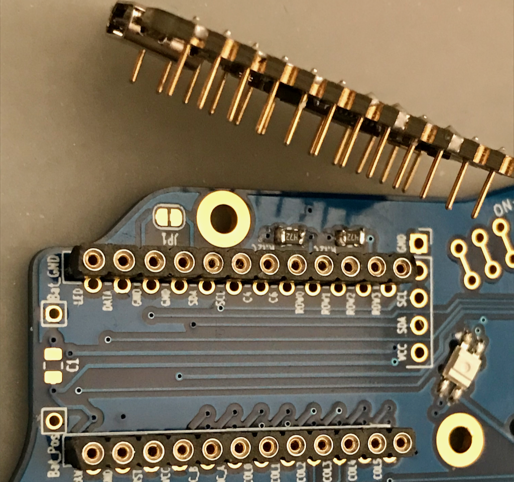 Sockets soldered to board, pins soldered to MCU